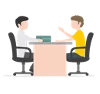 deux personnes assises face à face autour d'un bureau
